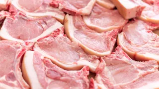 a close up photo of pork chops